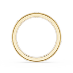Gold ring with a textured band on a white background