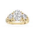 Gold ring with three diamonds on a white background