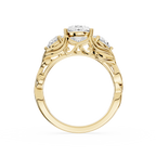 Gold ring with diamond accents on a white background