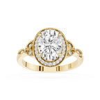 Gold ring with a large diamond and smaller diamonds on the band against a white background