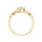 Gold ring with a diamond on a white background