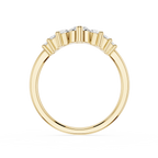 Gold ring with small diamonds on a white background