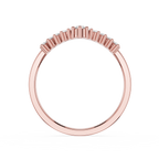 Rose gold ring with small diamonds on a white background