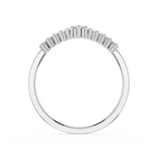 Silver ring with baguette cut diamonds on a white background