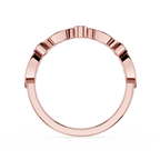 Rose gold ring with beveled edges on a white background