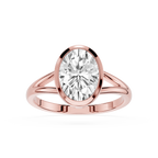 Rose gold ring with a large diamond on a white background