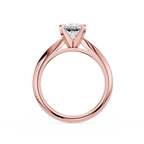 Rose gold ring with a diamond on a white background