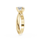 Gold ring with a diamond on a white background