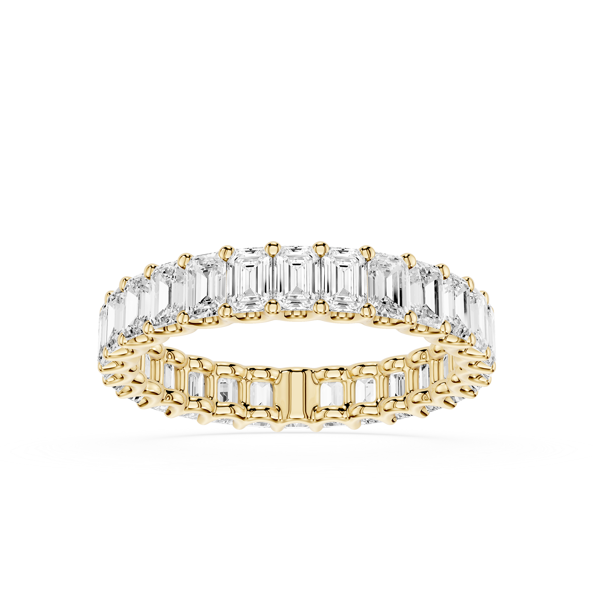 A yellow gold eternity ring featuring a double row of baguette-cut clear gemstones, shown on a clean white background.