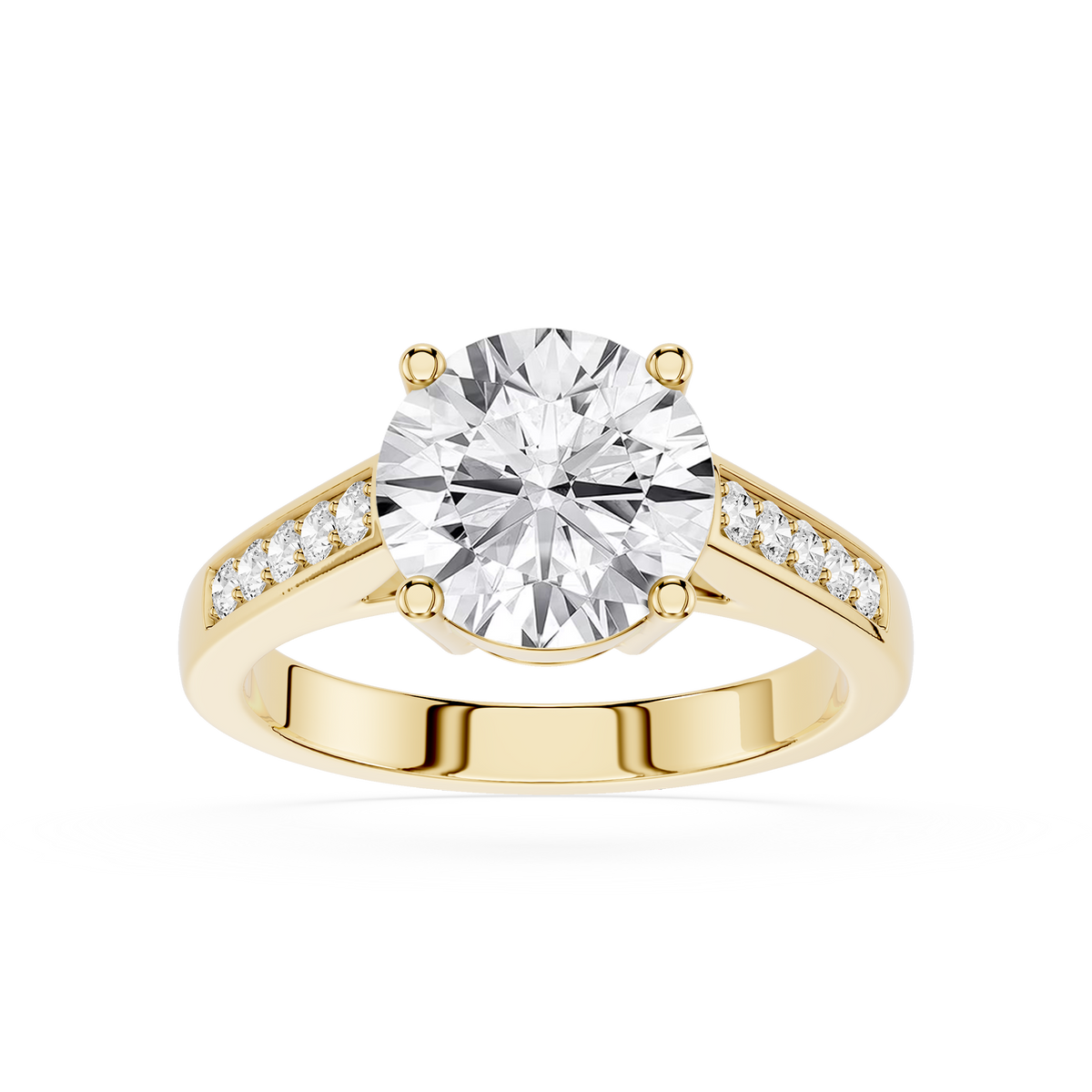 A lab-grown diamond engagement gold ring for women featuring a large round-cut diamond center stone and smaller diamonds set along the shoulders.