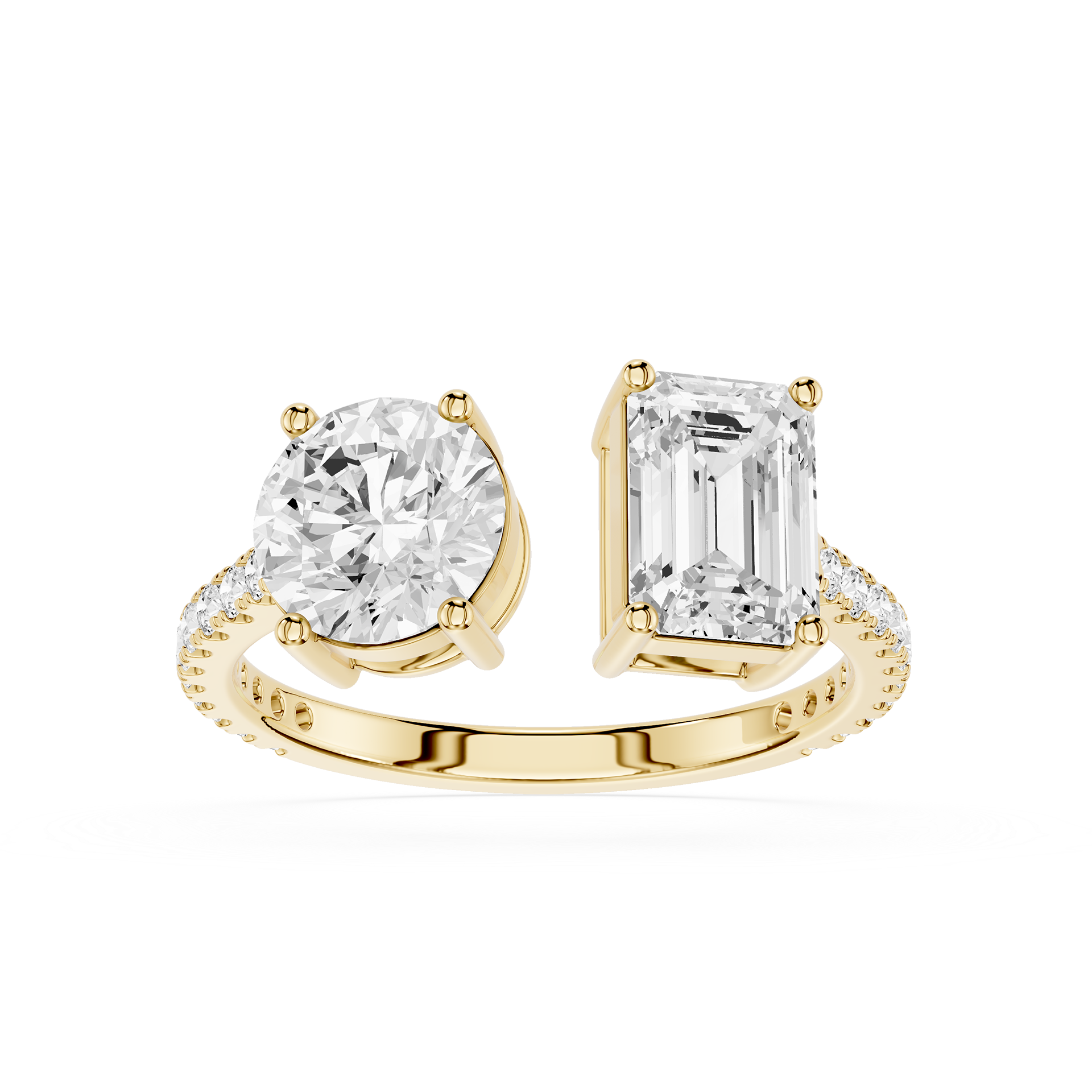 A yellow gold split-shank ring featuring a round brilliant-cut diamond on one side and an emerald-cut diamond on the other, with small pavé diamonds along the band, set against a plain white background.