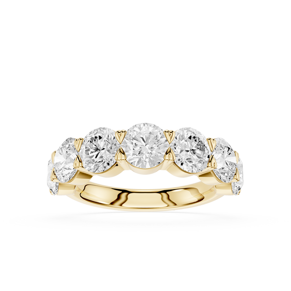 A yellow gold five-stone diamond ring with round brilliant-cut diamonds set in a row on a polished band, shown against a solid white background.